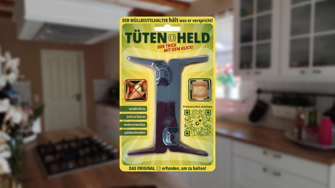 Video laden: Video zeigt den Tütenheld – einen innovativen Müllbeutelhalter – beim Einhängen, Fixieren und Festziehen von Mülltüten. Demonstration der stabilen Handhabung und der einfachen Reinigung in der Spülmaschine. Geeignet für Beutelgrößen von 13 cm bis 20,5 cm, ideal für Küche, Bad, Büro, Garten und Camping.